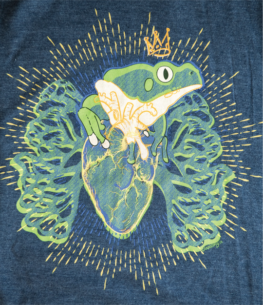 Frog with a crown on a human heart and lungs design on a blue shirt