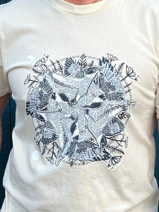 White t-shirt with black floral and geometric pattern with kingfishers